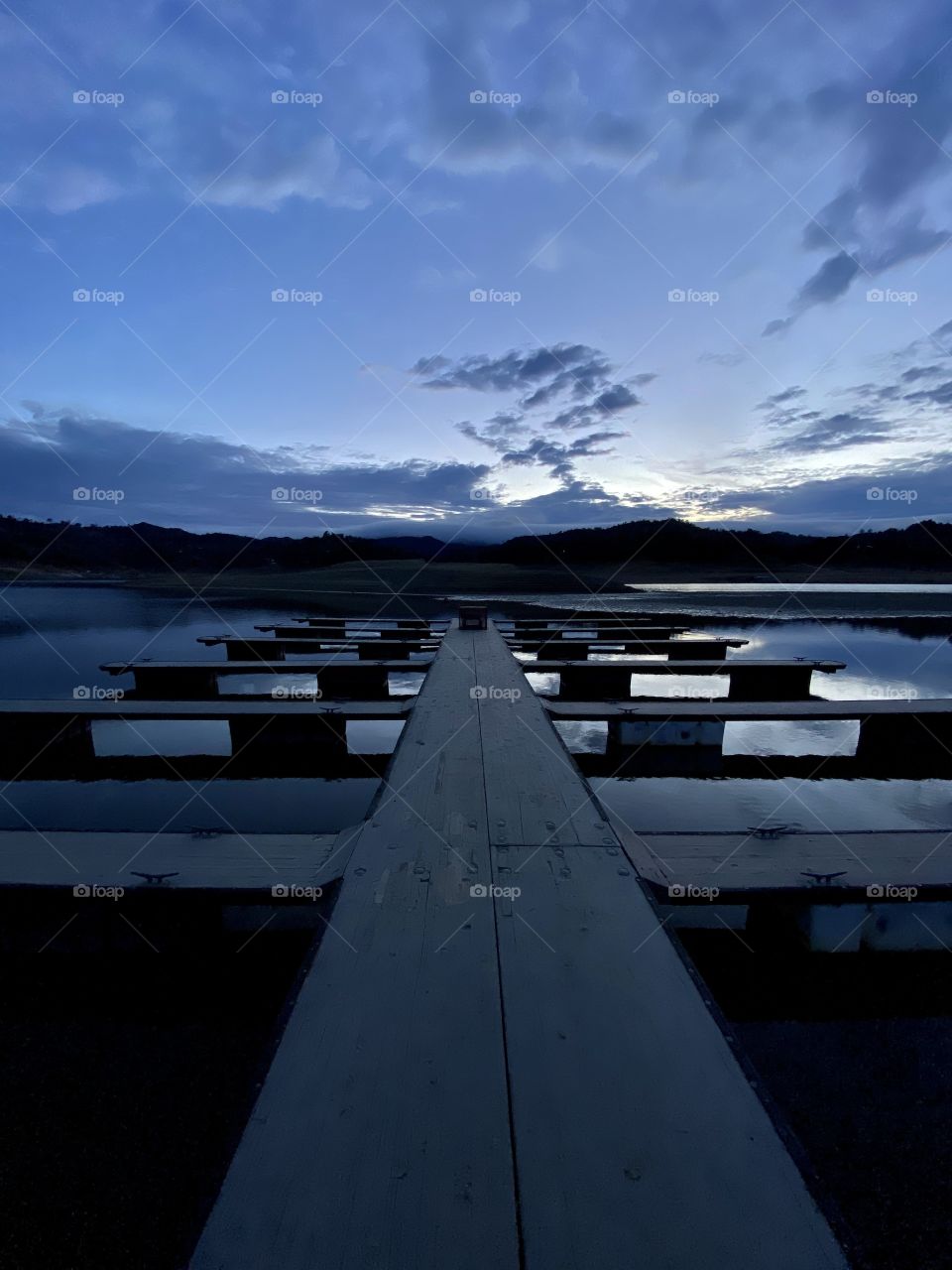 Sunset by a dock at Lake Nacimiento California 