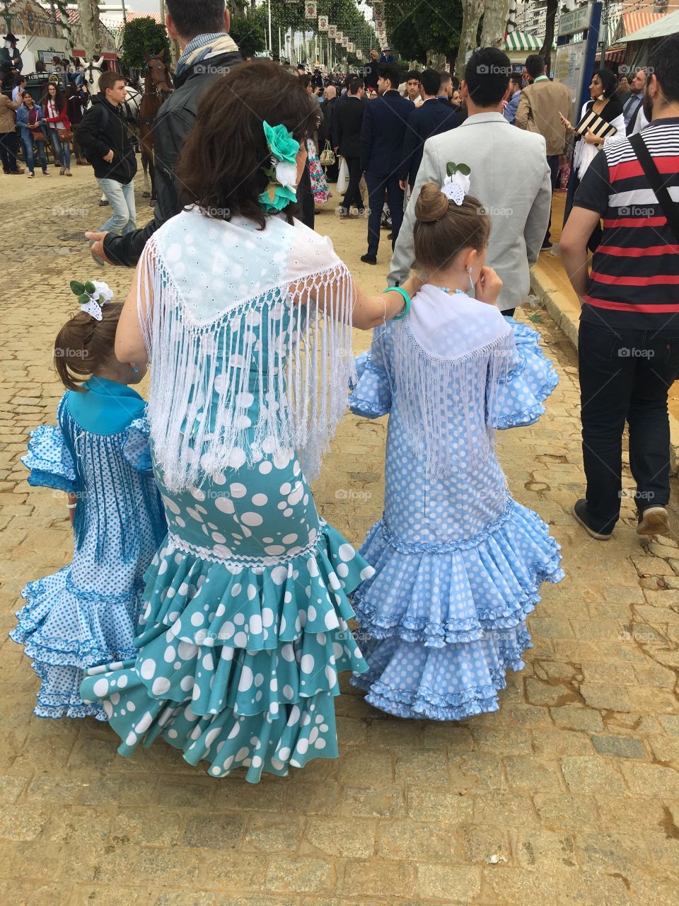 Mother and Daughters at Feria de Avril