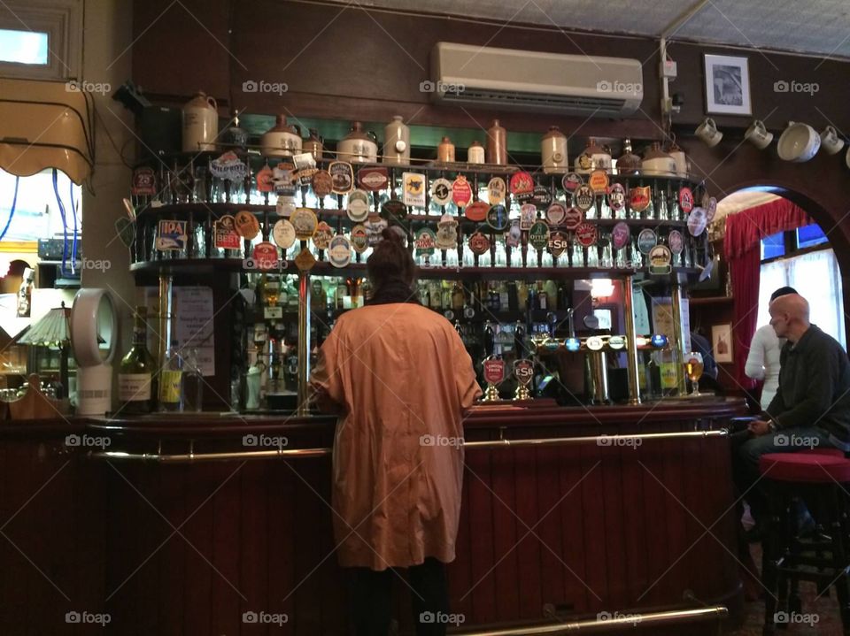 Bar in east end London . Beer tap in London bar 