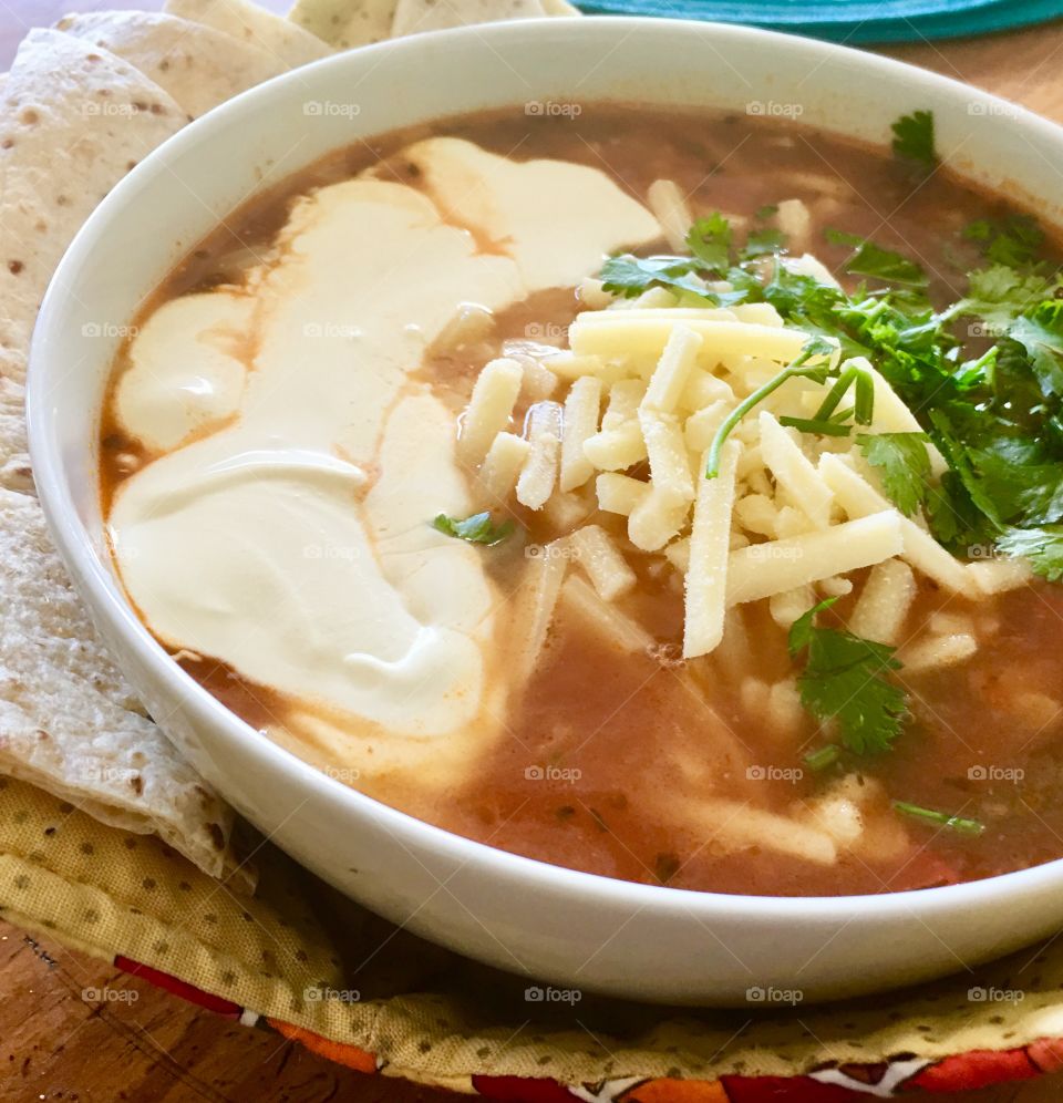 Hearty Mexican Beef Taco Soup in white bowl