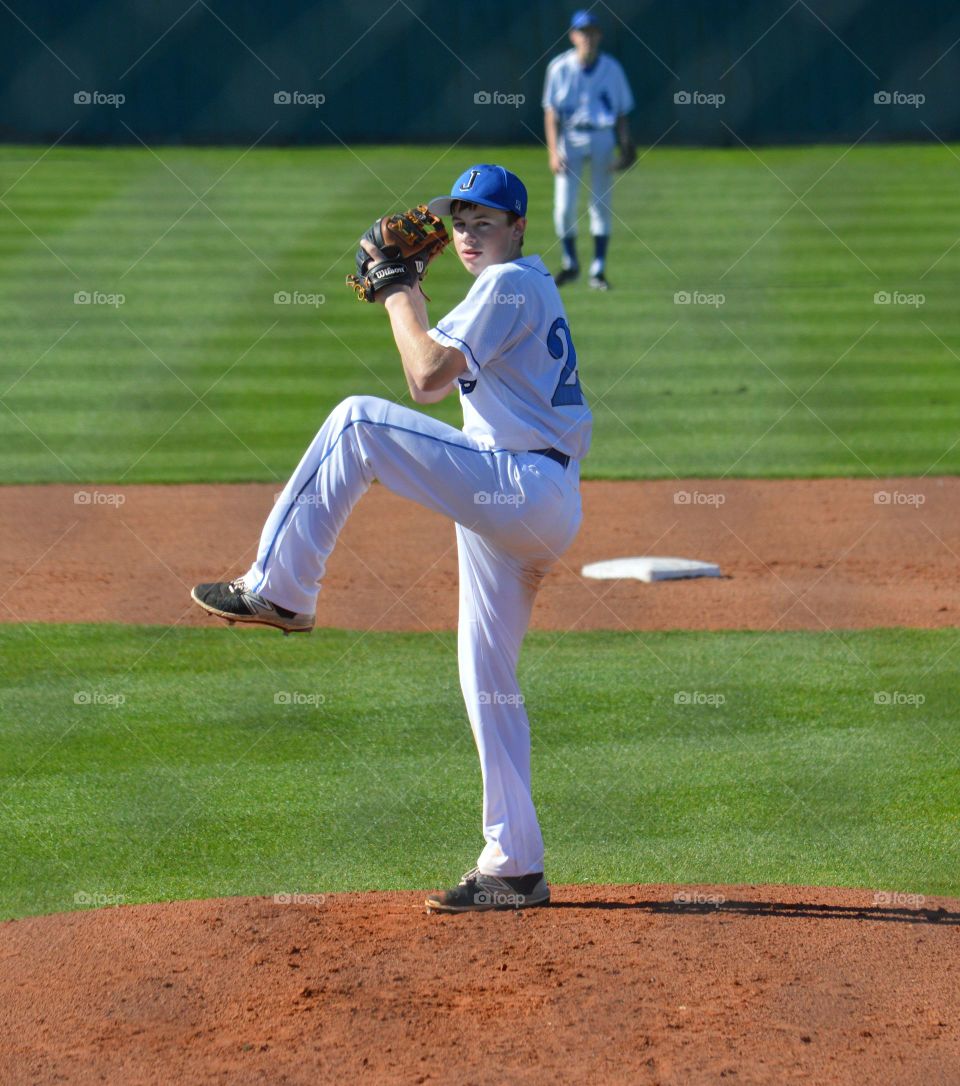 Pitcher leg kick. 