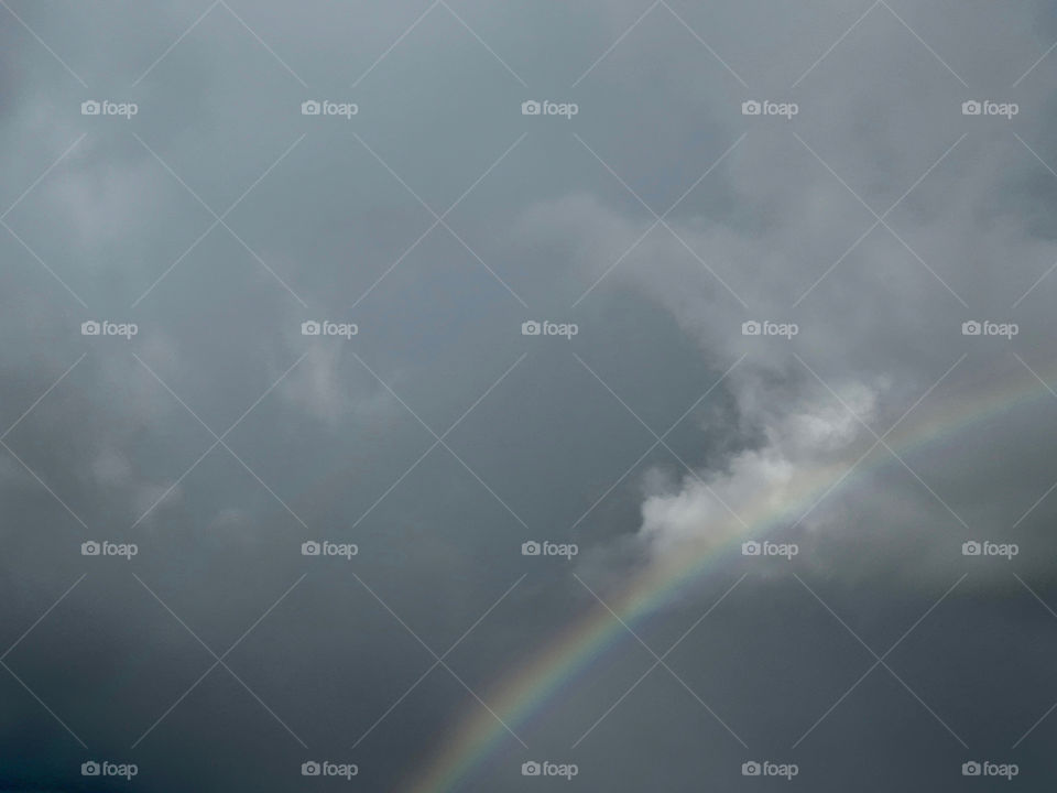 Cloudy Sky and Rainbow 