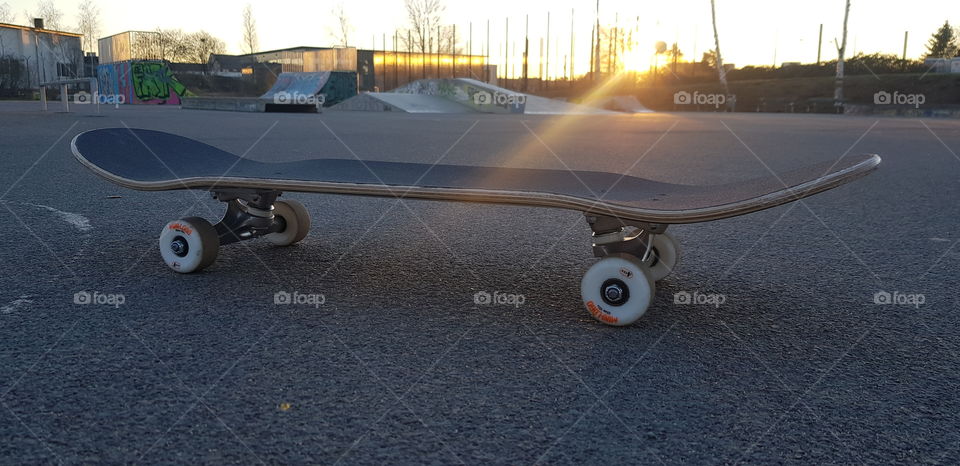 skateboard during sunrise