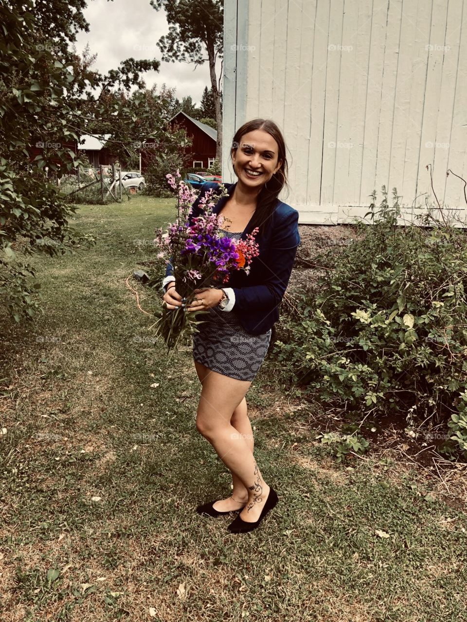 Happy girl with flowers 
