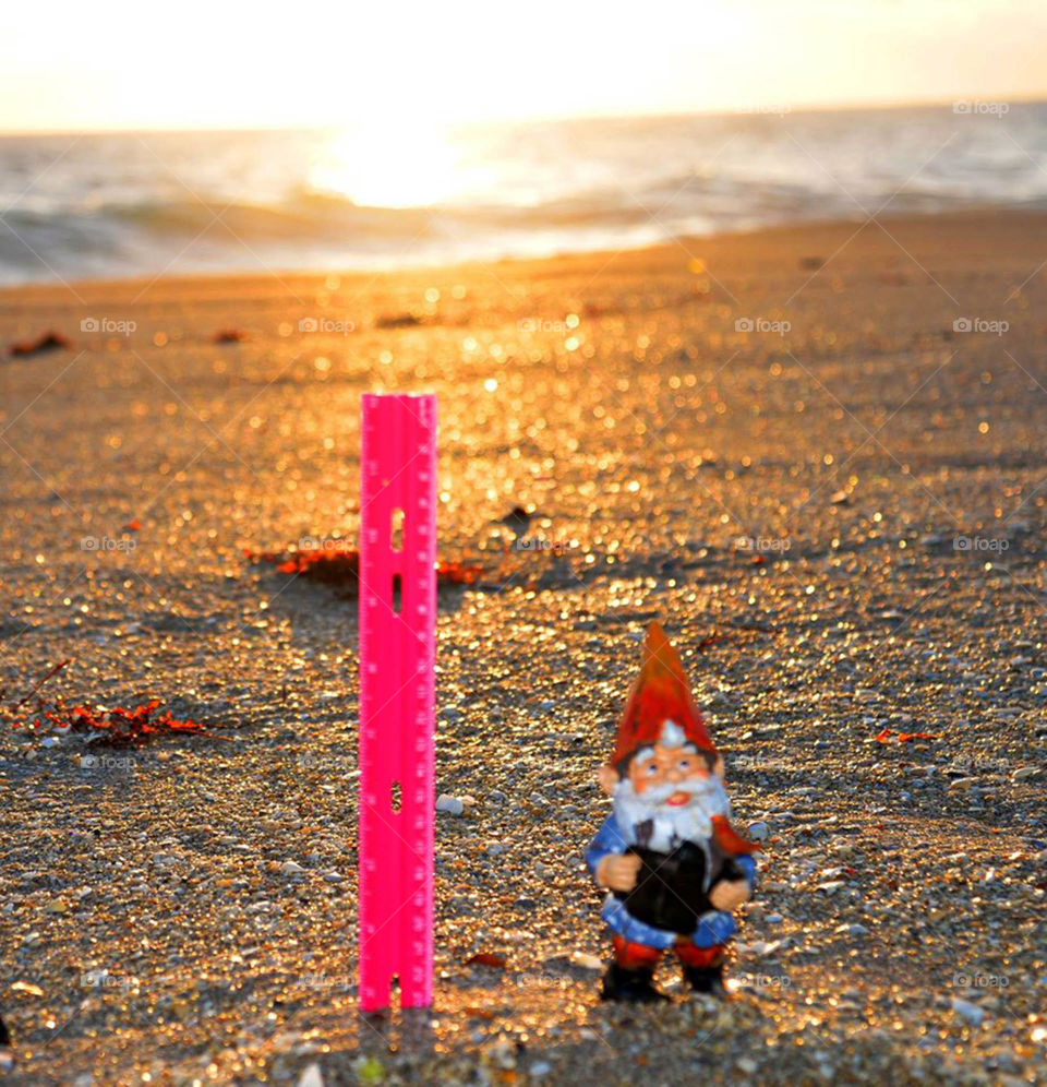 Gnome at the beach. This is how much snow we got in Florida, lol