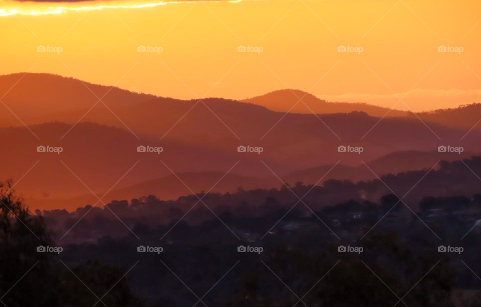 Sunset across mountains