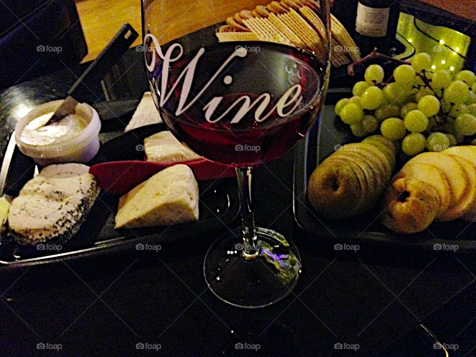 Close-up of cheese and wine