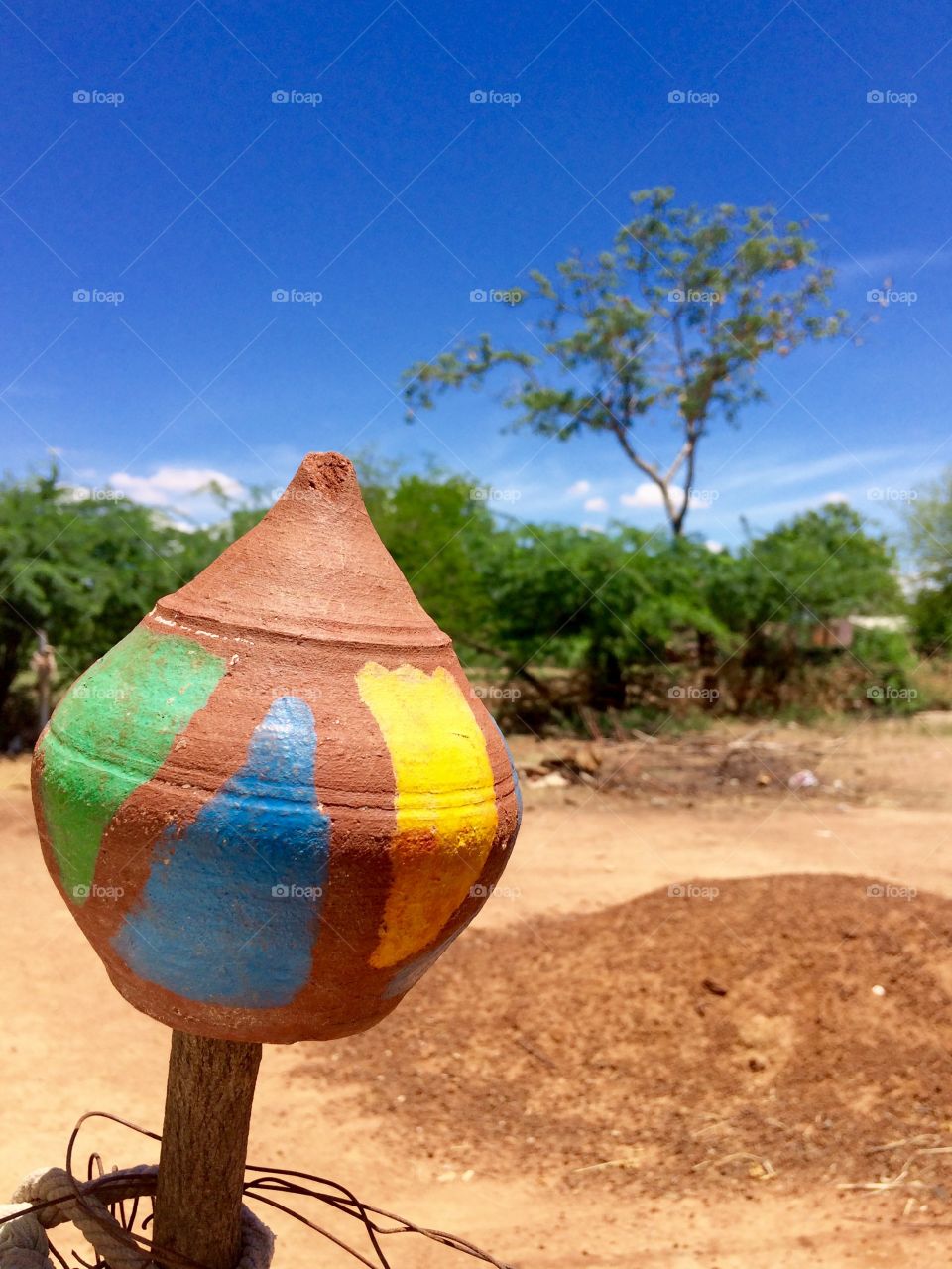 coloured sand pot and beautiful background nature 