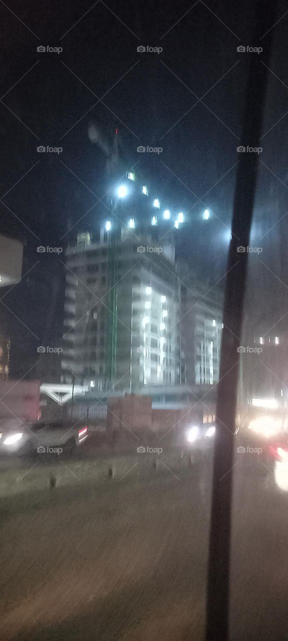 Twinkling windows , the beauty of evening light. Bask in the beauty of evening light with the view of light twinkling from these windows at night