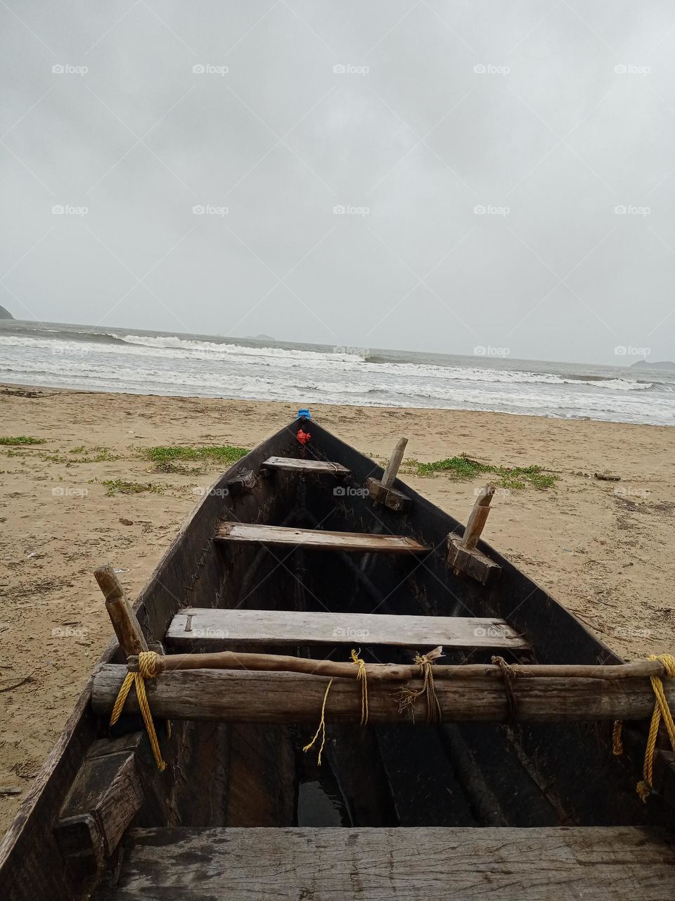 view of the sea from inside the black colour boat nice view