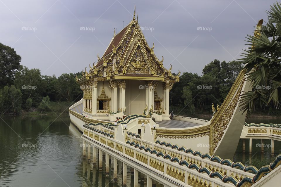 Church building in Buddhist temple on board A tourist attraction in Ubon Ratchathani, Thailand.