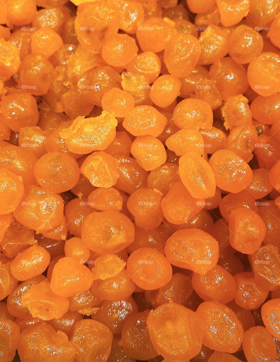 Dried kumquat. Dried fruit kumquat dried mandarin natural fruit candied kinkan. Background