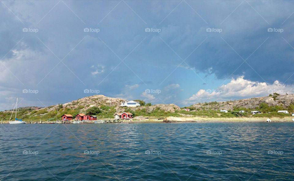 stormy clouds at sunny summer day