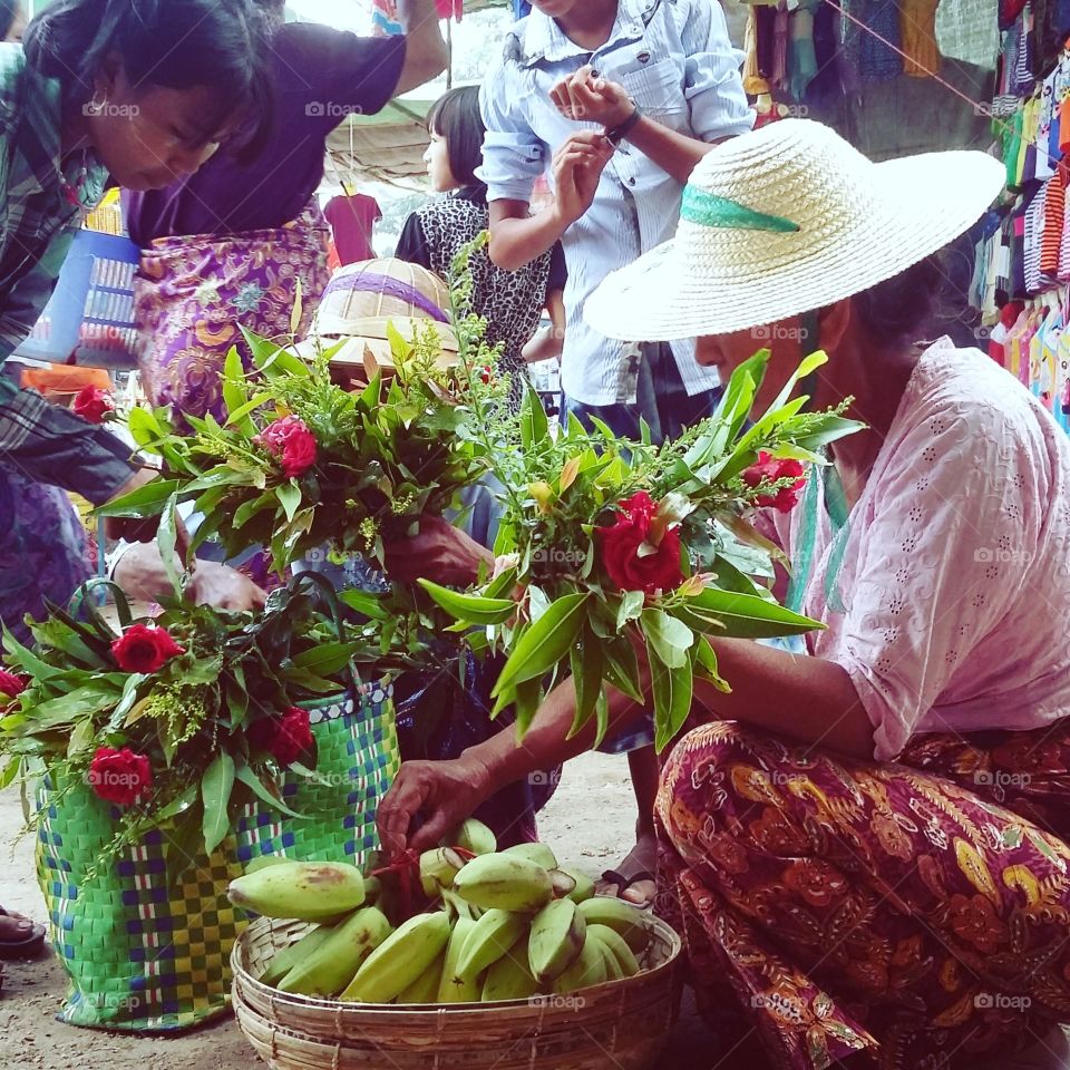 Exploring Myanmar. woman selling flowers