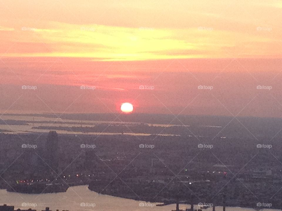 Sunrise from the top of One World Trade Center in Manhattan