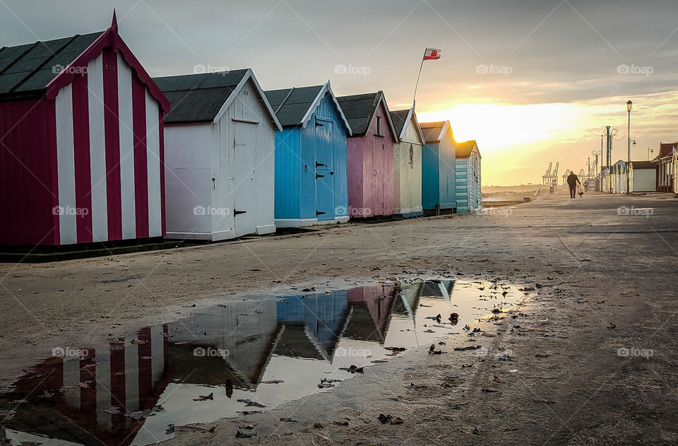 beautiful beach huts reflection