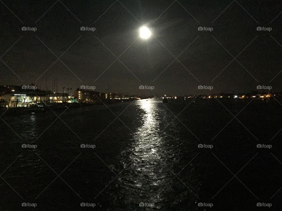 Newport  Harbor under the full moon. 