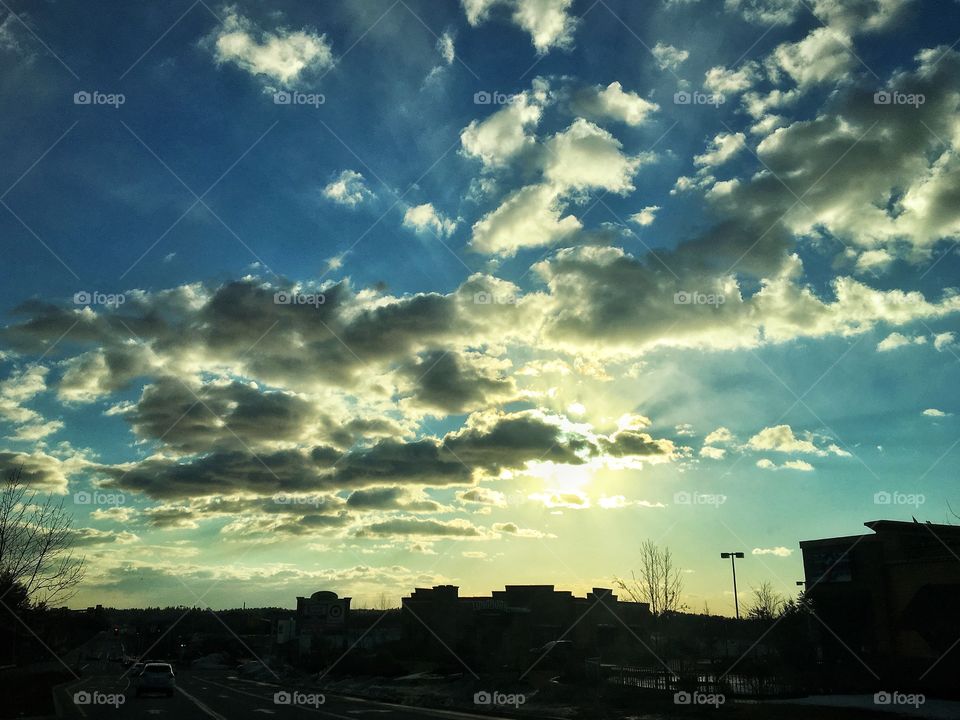 Sun behind clouds
