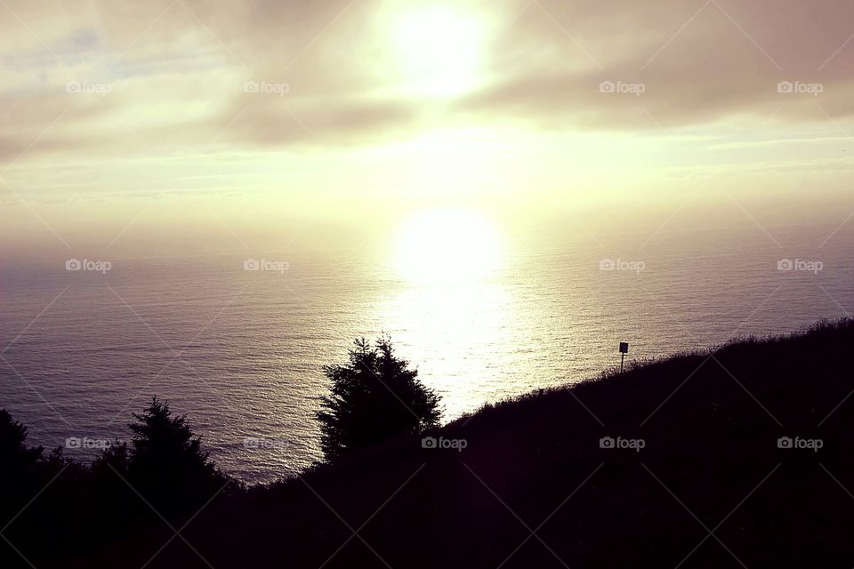 Breathtaking view of the sunset over the Pacific Ocean in the Pacific Northwest  from the top of Cascade Head.