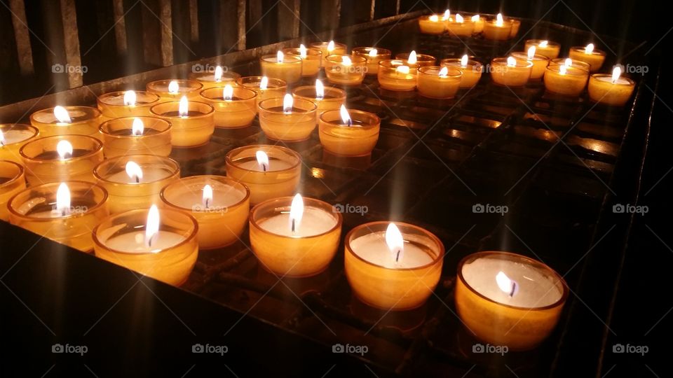 votive candles in church