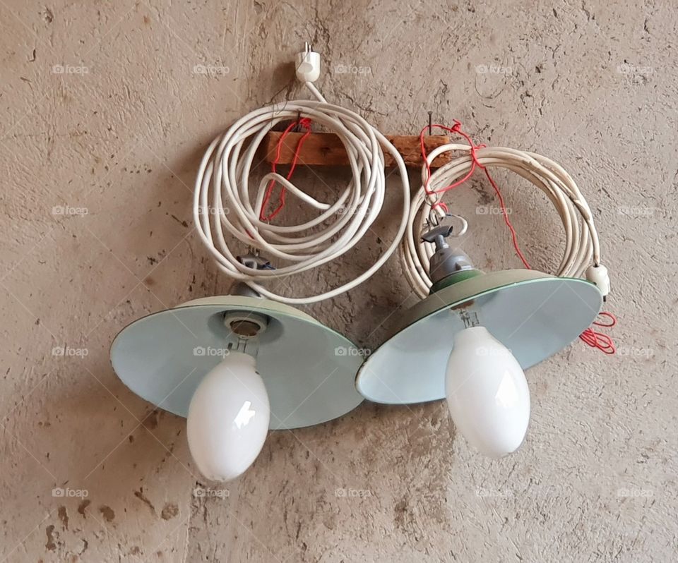 two lights stuck to the wall