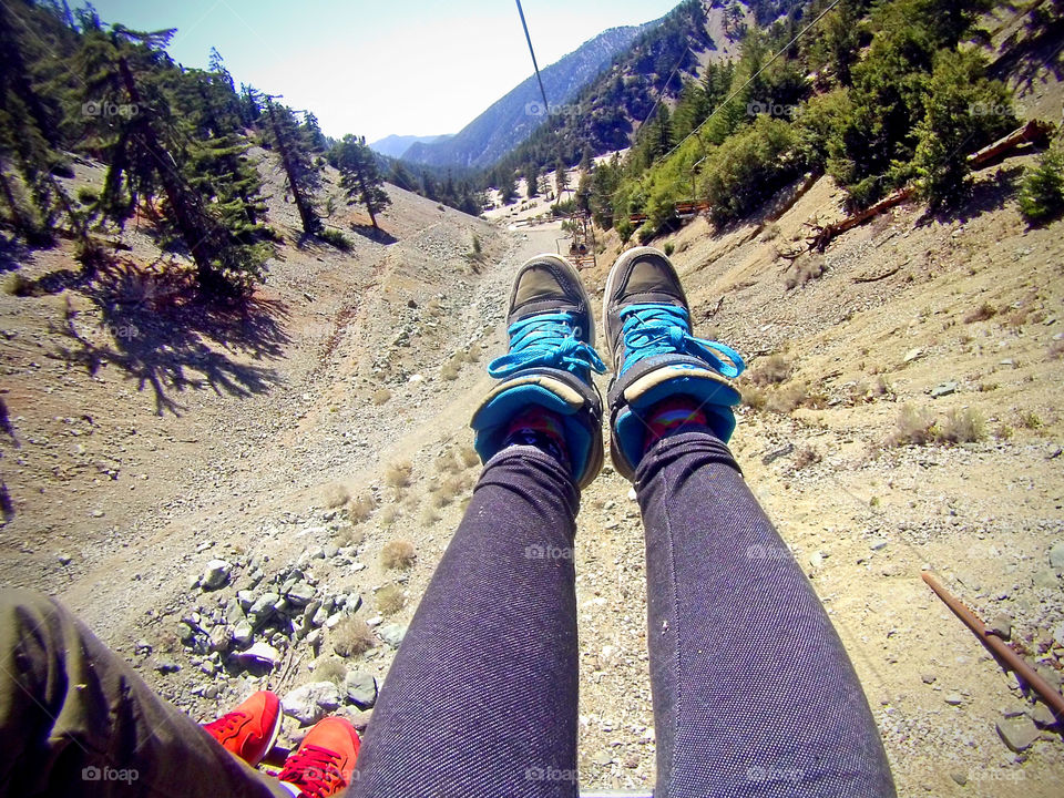 top down shot feet, from where I stand, chair lift, mountain