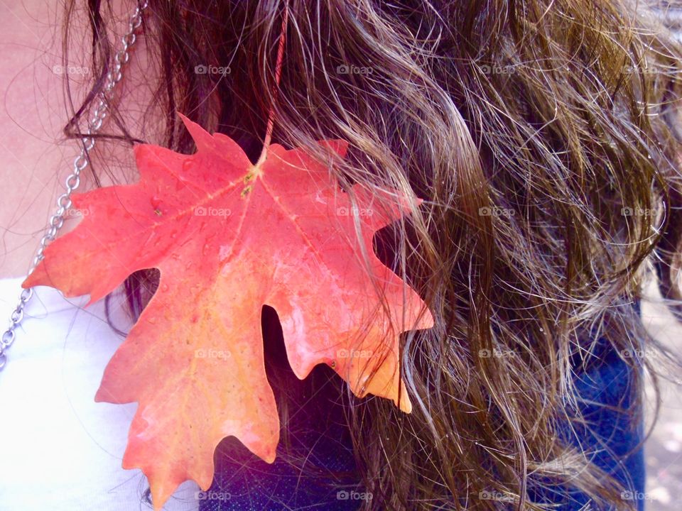 This autumn leaf looked so good against this dark hair and coat that a picture had to be taken. Fall colors are so beautiful!