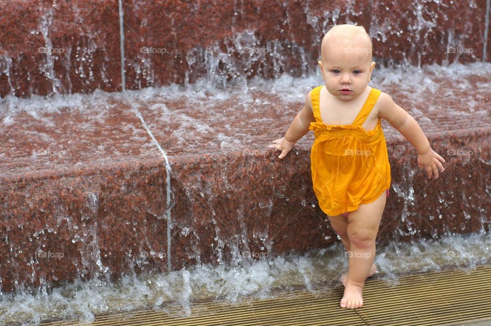 Baby in water fall