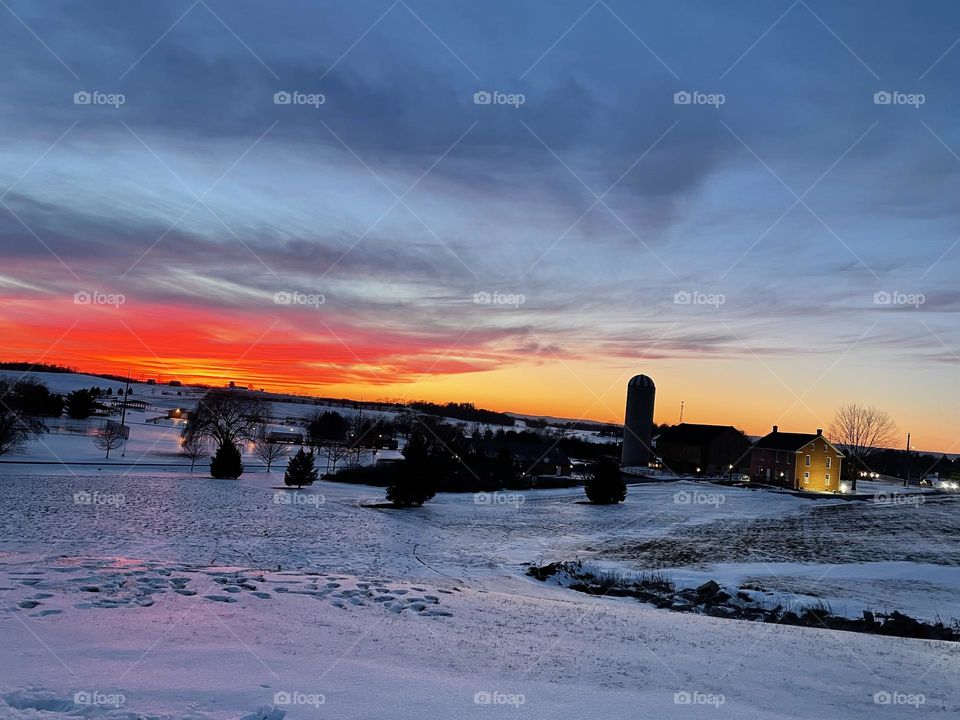 Sunset snow day on farm 