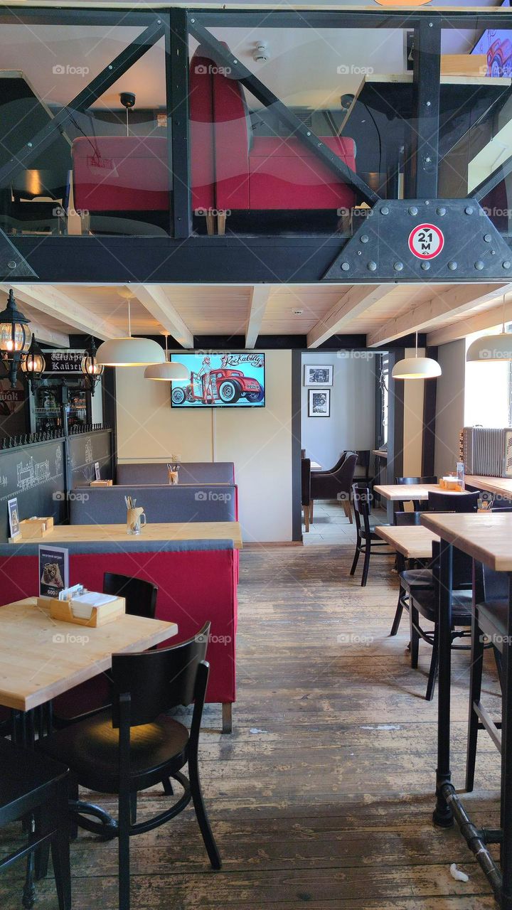 Cafe interior.  General view of the two-story cafe.  Retro style