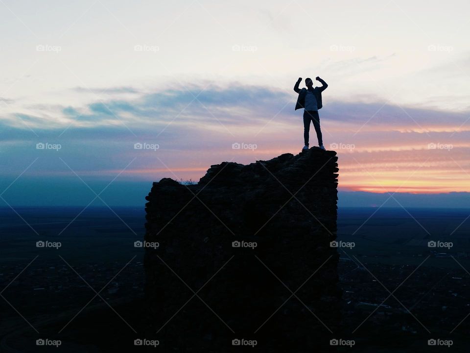 happiness above the Şiria fortress at sunset