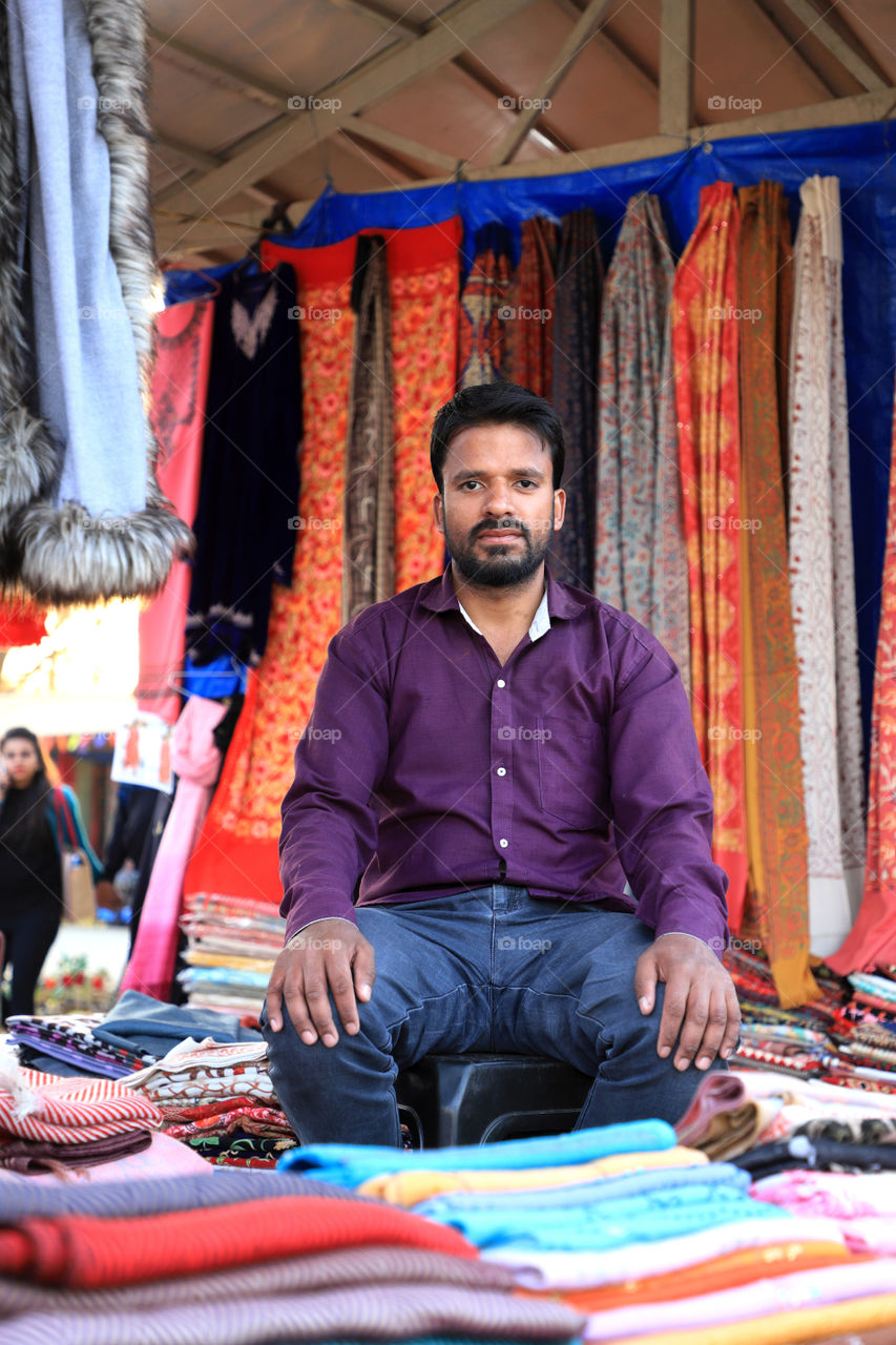 Seller at the surajkund international crafts fair, surajkund, faridabad, haryana, India