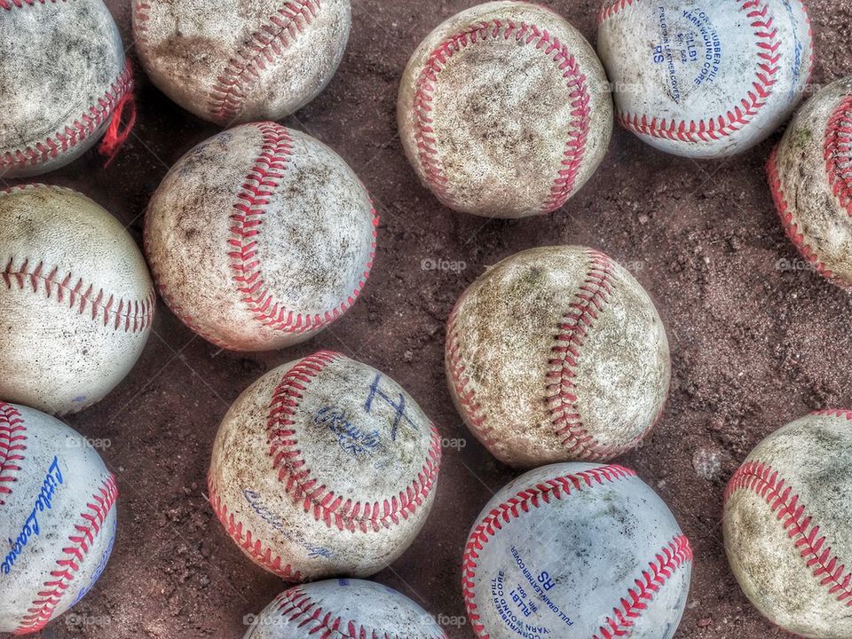 Baseballs Waiting For The Game. Worn And Torn And Loved Collection Of Baseballs
