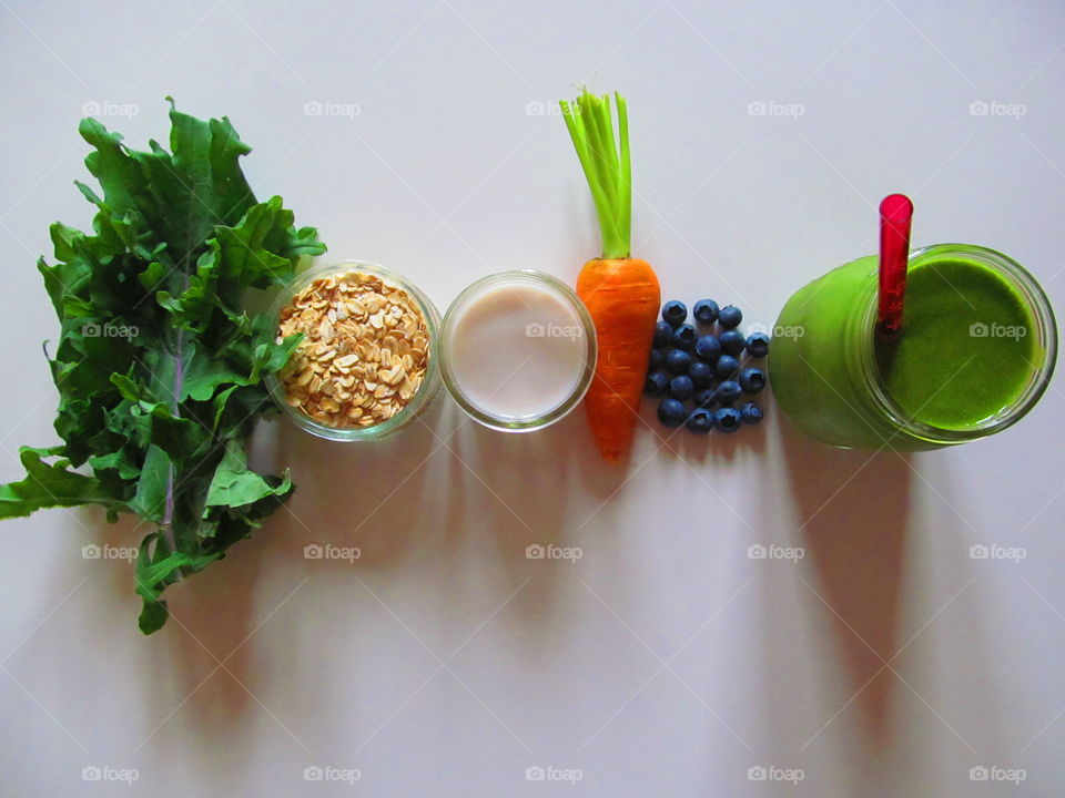 Vegetable smoothie against white background