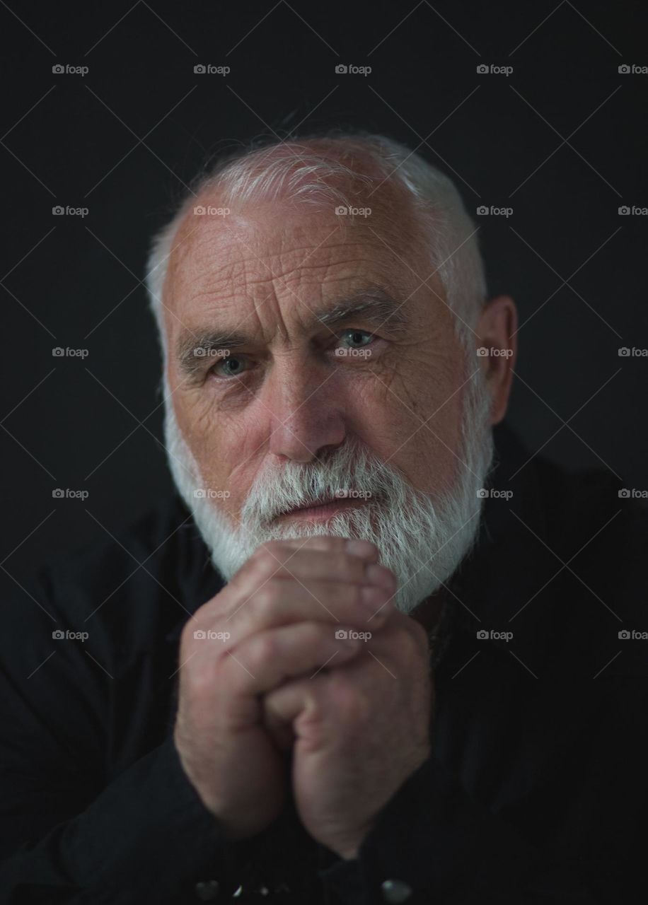 Portrait of an adult, emotions, wrinkles and the history of a person’s life in one portrait. Unique face skin stories