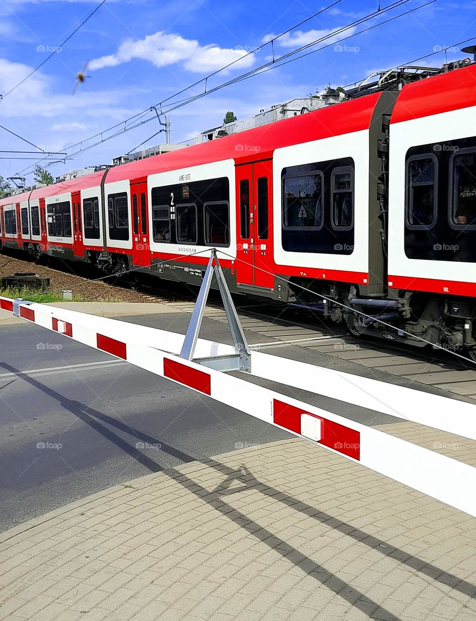 a level crossing/ a railroad crossing