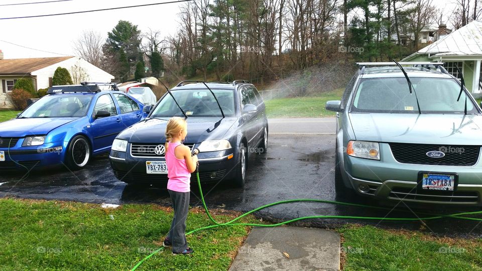 Helping wash the cars