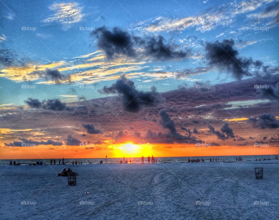 People enjoying on beach