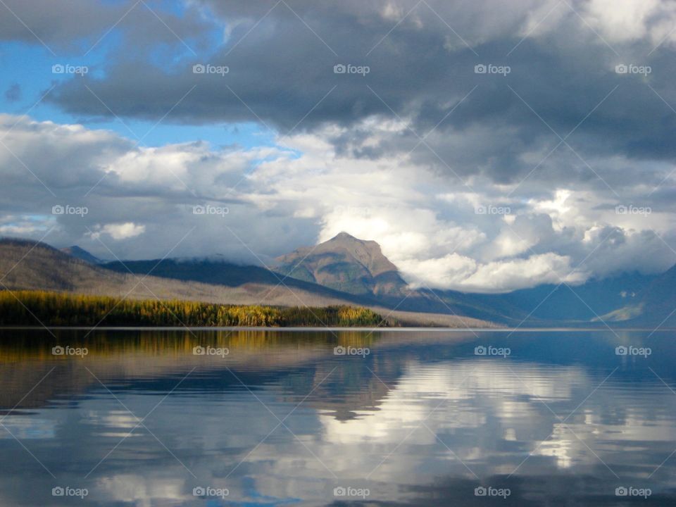 Cloudscape reflecting on river