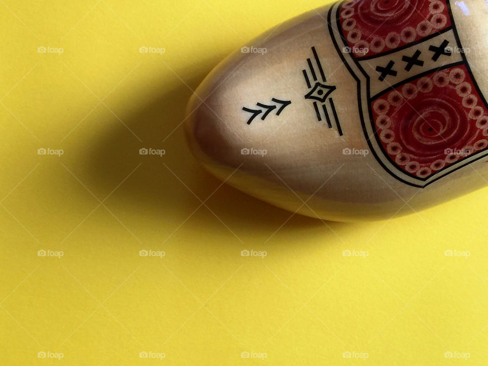 Traditional clog in yellow background
