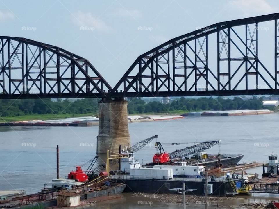 barges construction Mississippi river side