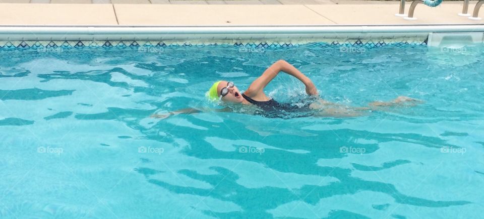 Freestyle Stroke. My daughter is training for swim team tryouts. I decided to take some shots of her practicing. 