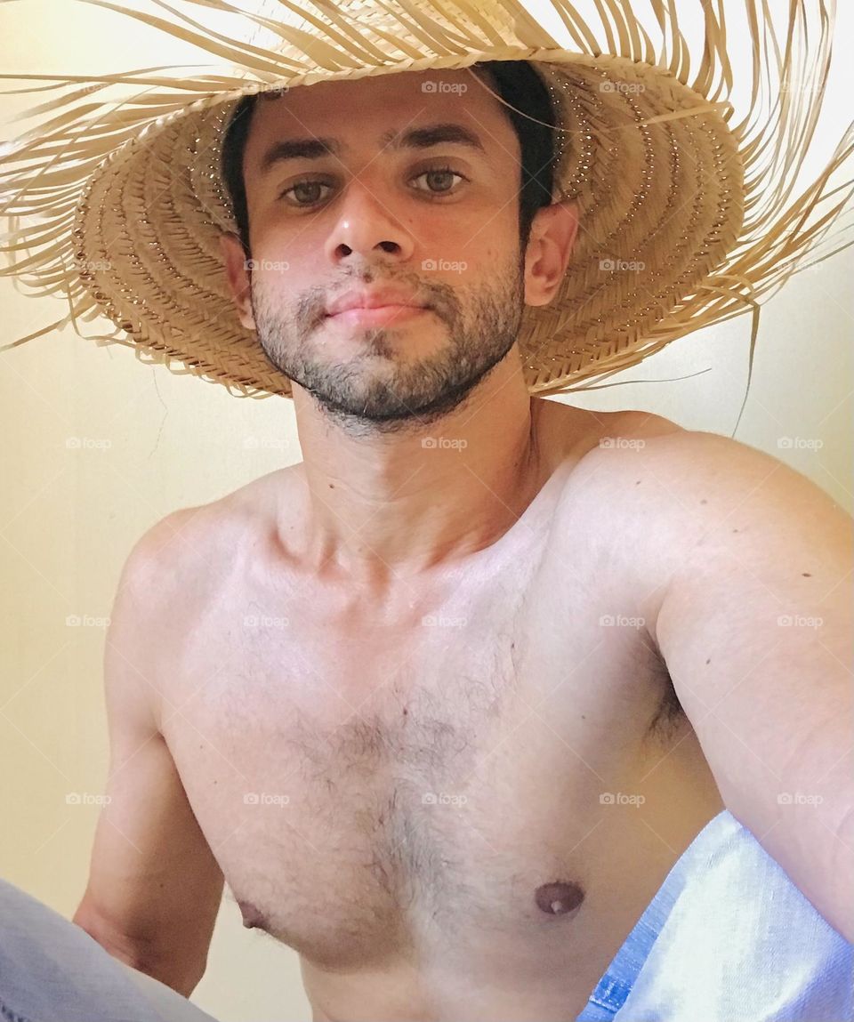 handsome man fisherman with straw hat