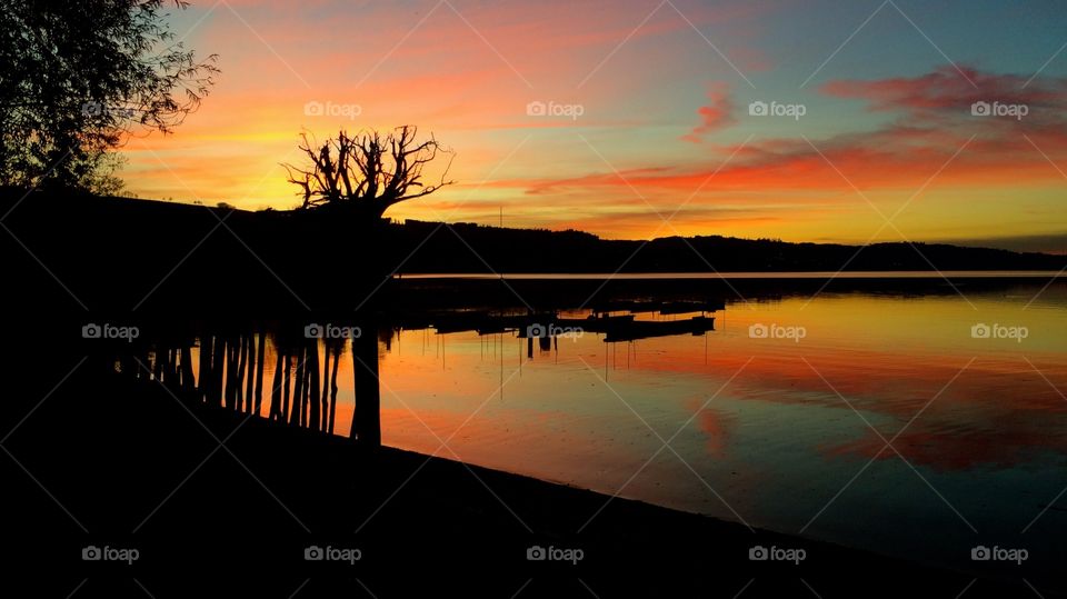 Reflection of dramatic sky in water