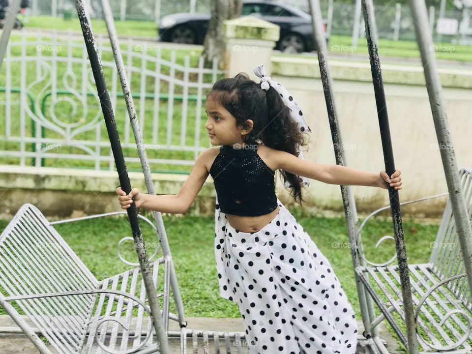 Girl with polka dots dress 