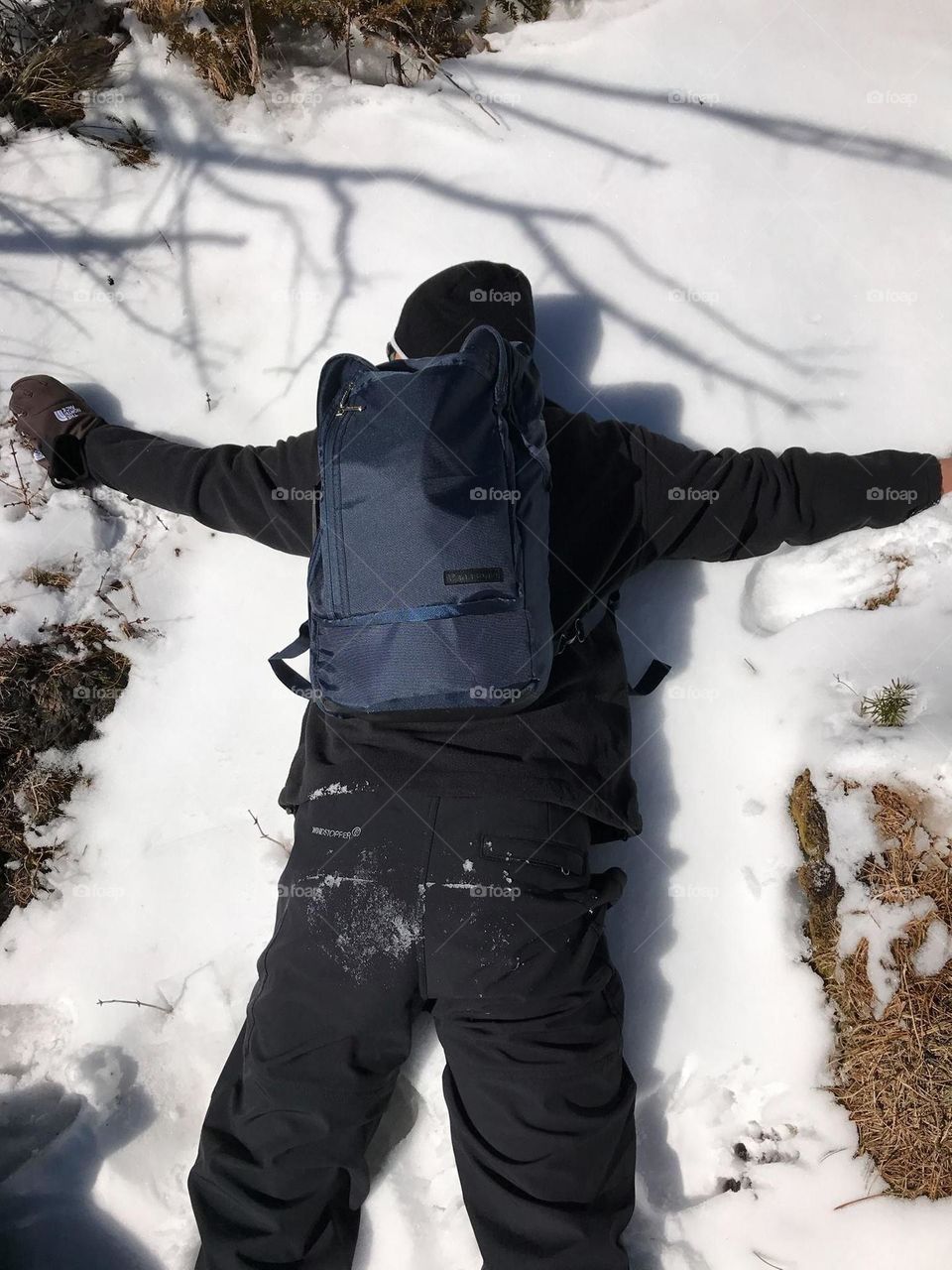 I m lying in the snow at Hallasan Mountain