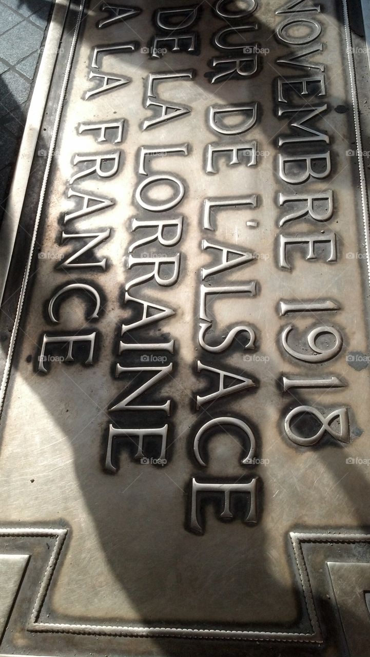 Under the Arc de Triomphe in Paris