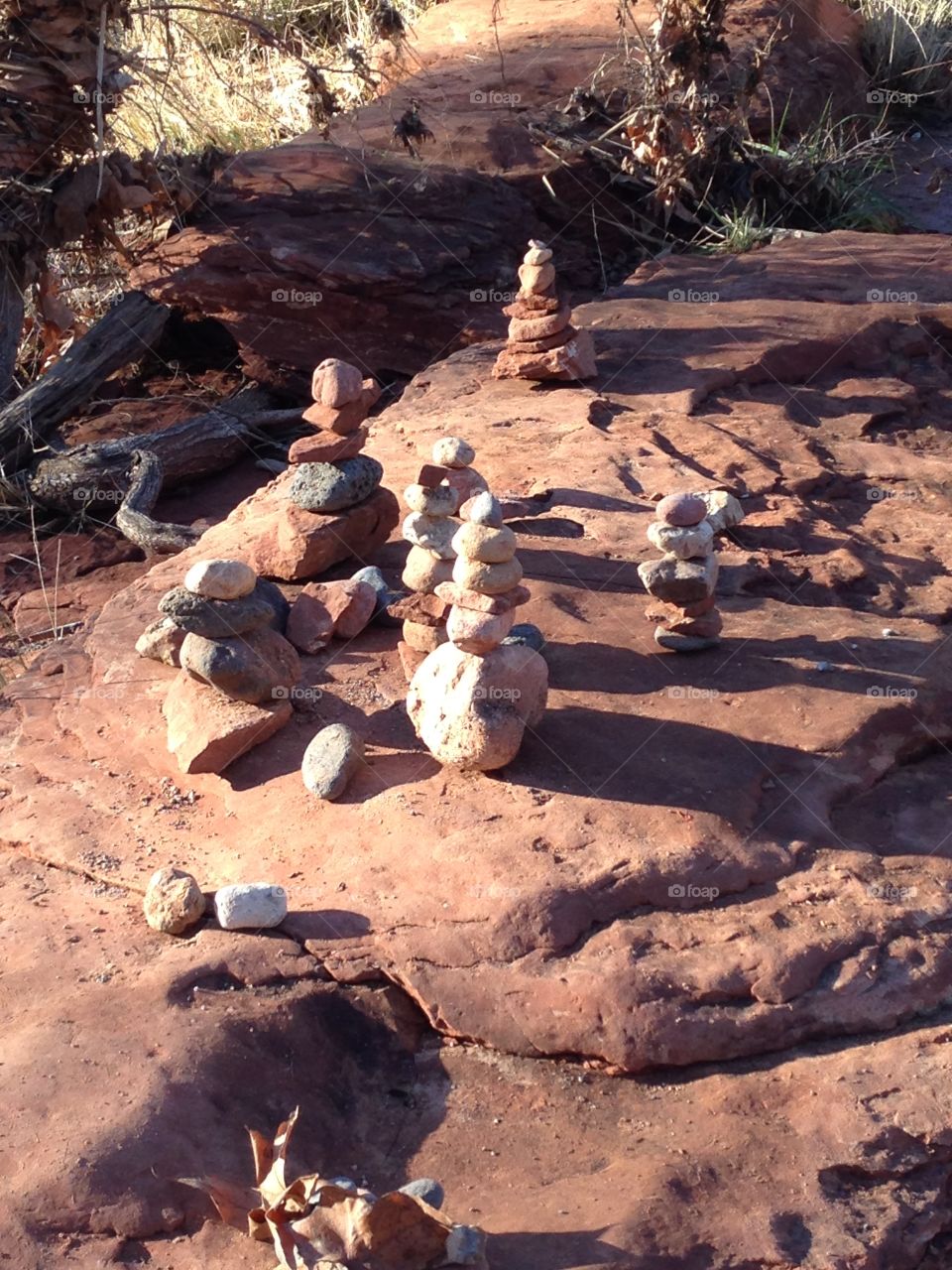 Stacked rock cairns