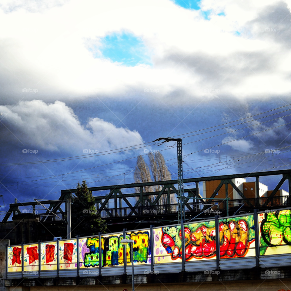 graffiti clouds urban bridge by jikachkmo