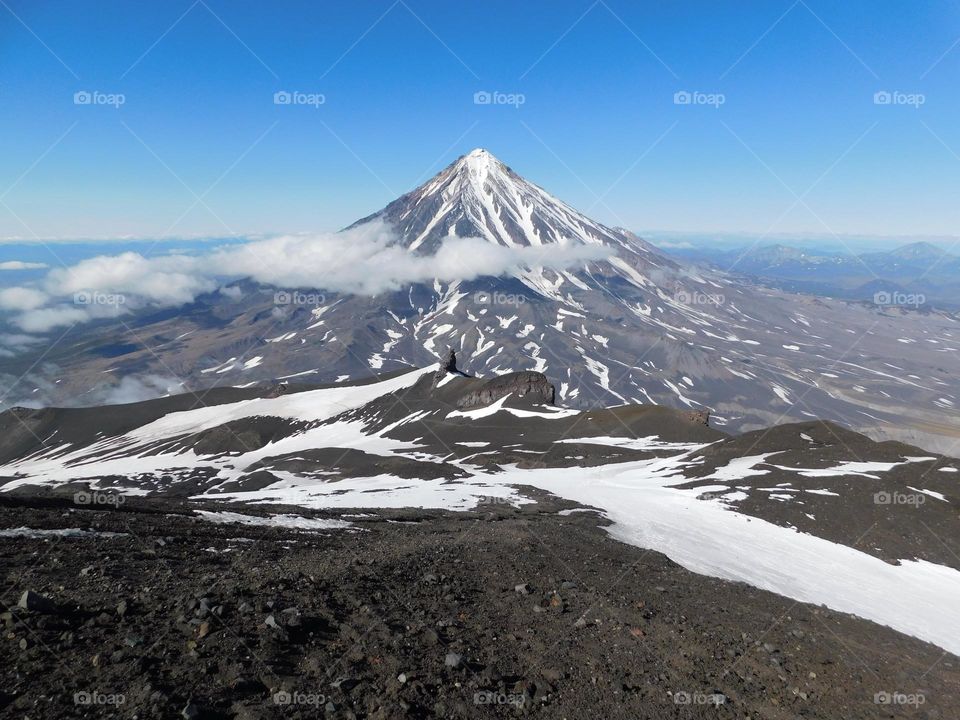 Snow-covered top of a volcano in Kamchatka